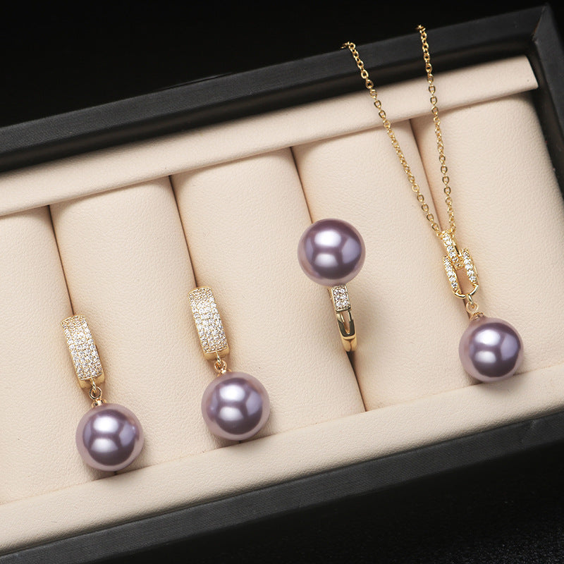 Shell pearl set jewelry three-piece female fashion temperament is round bright light beaded necklace pendant ring earrings