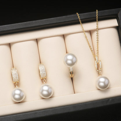 Shell pearl set jewelry three-piece female fashion temperament is round bright light beaded necklace pendant ring earrings