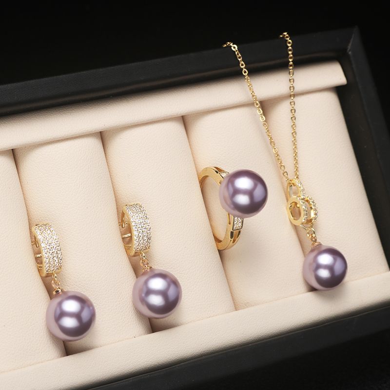Shell pearl set jewelry three-piece female fashion temperament is round bright light beaded necklace pendant ring earrings